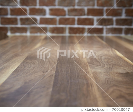 Wood table and wall background in kitchen Wood table and wall background in kitchen 70010047