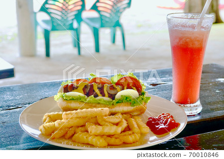 Hot dog and water melon juice @ beach Hot dog and water melon juice @ beach 70010846