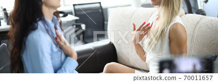 Journalist is interviewing dispute ensued between opponents. Journalist is interviewing dispute ensued between opponents. 70011657