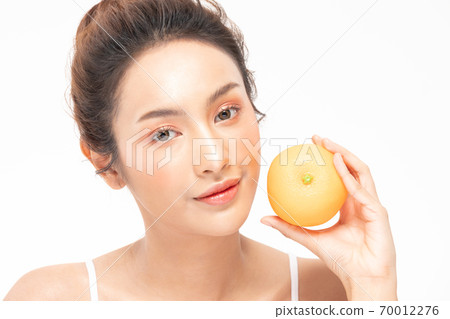 Beautiful Young Asian Woman Holding orange vitamin c smile feeling so happy and cheerful with healthy Clean and Fresh skin,isolated on white background,Beauty Cosmetics spa and treatment Concept Beautiful Young Asian Woman Holding orange vitamin c smile feeling so happy and cheerful with healthy Clean and Fresh skin,isolated on white background,Beauty Cosmetics spa and treatment Concept 70012276
