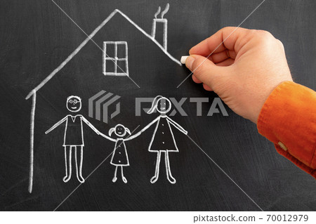 Teaching child, to stay at home in enjoyable and recreation way to keep social distance. drawing to chalk board. 70012979