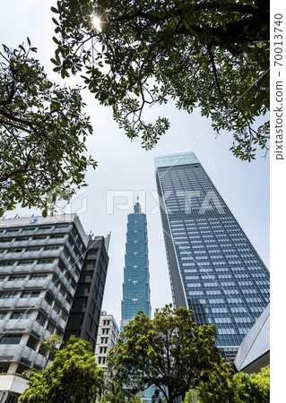 view of Taipei 101 skyscrapers in Taipei, Taiwan. the Xinyi District is a prime shopping area in Taipei, anchored by a number of department stores and malls. view of Taipei 101 skyscrapers in Taipei, Taiwan. the Xinyi District is a prime shopping area in Taipei, anchored by a number of department stores and malls. 70013740