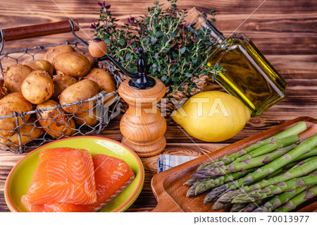 Set of fresh products for healthy food on wooden table 70013977