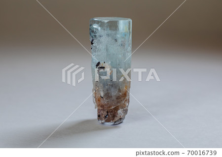 Amazing colorful Quartz Rainbow Flame Blue Aqua Aura crystal cluster closeup macro isolated on white background. Amazing colorful Quartz Rainbow Flame Blue Aqua Aura crystal cluster closeup macro isolated on white background. 70016739