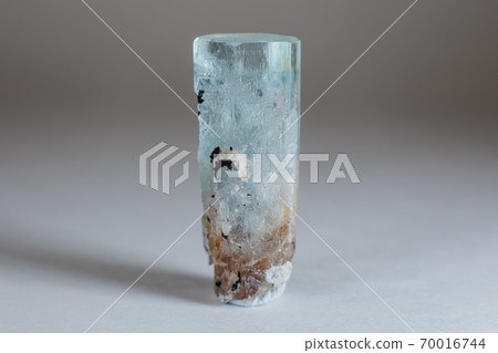 Amazing colorful Quartz Rainbow Flame Blue Aqua Aura crystal cluster closeup macro isolated on white background. Amazing colorful Quartz Rainbow Flame Blue Aqua Aura crystal cluster closeup macro isolated on white background. 70016744