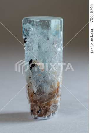Amazing colorful Quartz Rainbow Flame Blue Aqua Aura crystal cluster closeup macro isolated on white background. 70016746