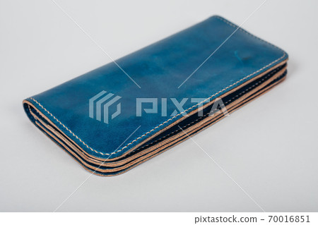 blue leather case notebook isolated on white background. 70016851