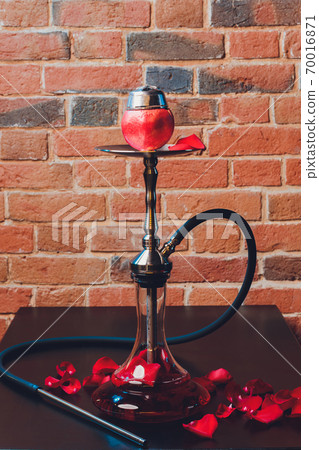Shisha With Fruit Bowl With Colorful Smoke In Hookah Bar Closeup. Shisha With Fruit Bowl With Colorful Smoke In Hookah Bar Closeup. 70016871