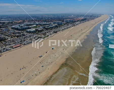 Aerial view of Huntington Beach and coastline during hot blue sunny summer day 70020407