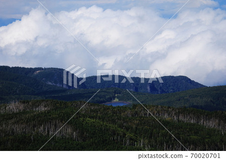 View of the northern Yatsugatake rain pond from the summit of Mt. Higashi Tengu, the Yatsugatake mountain range in early autumn 70020701