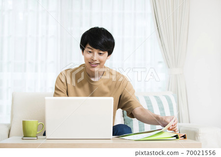 Young men telework remote work online conference online class Young men telework remote work online conference online class 70021556