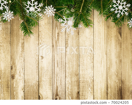Wood grain background decorated with fir tree and snow ornaments-there are multiple variations Wood grain background decorated with fir tree and snow ornaments-there are multiple variations 70024205