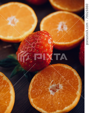 Fresh organic fruits strawberries, tangerines, pomegranates Fresh organic fruits strawberries, tangerines, pomegranates 70028860