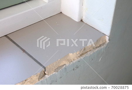 Broken windowsill in a house 70028875