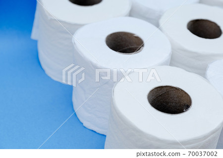 Toilet paper isolated on a blue background 70037002