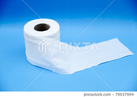 Toilet paper isolated on a blue background Toilet paper isolated on a blue background 70037004