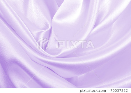 Smooth elegant lilac silk or satin texture as wedding background. Luxurious background design Smooth elegant lilac silk or satin texture as wedding background. Luxurious background design 70037222