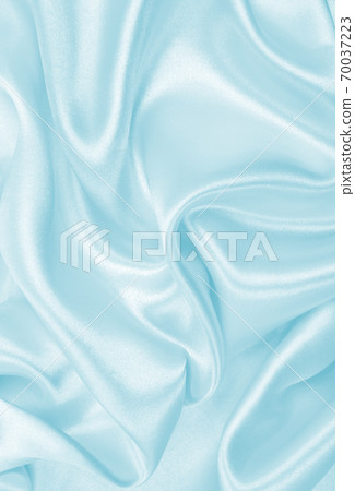 Smooth elegant blue silk or satin luxury cloth texture as abstract background. Luxurious background design Smooth elegant blue silk or satin luxury cloth texture as abstract background. Luxurious background design 70037223