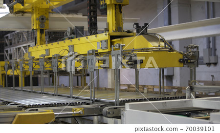 Modern robotic Aluminium extrusion production line factory warehouse. Plastic windows manufacture. 70039101