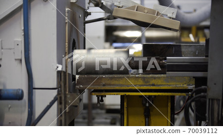 Aluminium extrusion production line factory. Production of Complex lightweight extruded aluminium metal profiles, commonly used as material in construction and manufacturing 70039112
