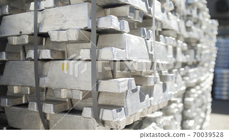 Aluminum ingots in Stock Warehouse. Billets for aluminium profile production at a metallurgical plant 70039528