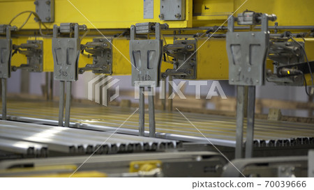 Aluminium extrusion production line factory warehouse. Plastic windows manufacture. Aluminium extrusion production line factory warehouse. Plastic windows manufacture. 70039666