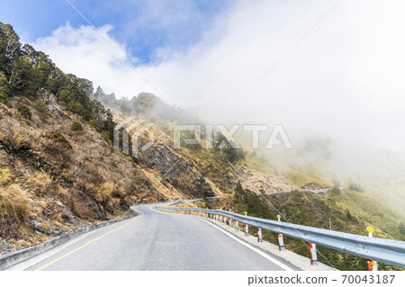 mountain of asphalt road in Hehuan mountain, Taiwan, Asia. Taroko National Park is one of Taiwan's most popular tourist attractions. mountain of asphalt road in Hehuan mountain, Taiwan, Asia. Taroko National Park is one of Taiwan's most popular tourist attractions. 70043187