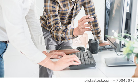 Programmer working in a software development and coding technologies. Website design.Technology concept. Programmer working in a software development and coding technologies. Website design.Technology concept. 70045075