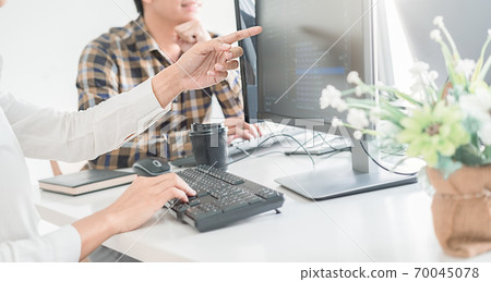 Programmer working in a software development and coding technologies. Website design.Technology concept. Programmer working in a software development and coding technologies. Website design.Technology concept. 70045078