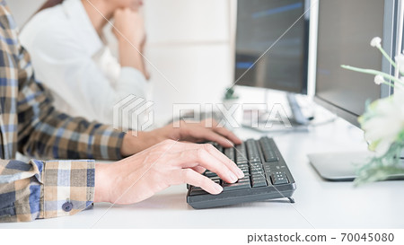 Programmer working in a software development and coding technologies. Website design.Technology concept. 70045080