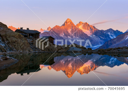 Colourful sunset on Lac Blanc lake in France Alps 70045695