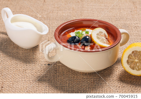 Soup saltwort with meat, potatoes, tomatoes, lemon and black olives 70045915
