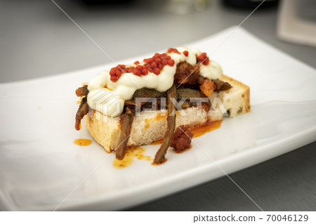 Asparagus toast with paprika and mayonesa in catering tasting 70046129