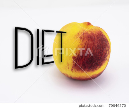 Diet concept with ripe peach of the Mediterranean basin of orange, yellow and reddish colors, ready for consumption 70046270