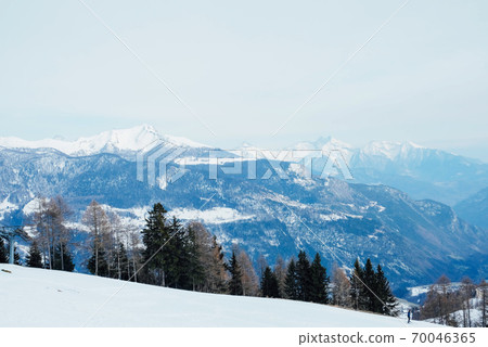 Winter landscape with mountain slopes covered with snow. 70046365