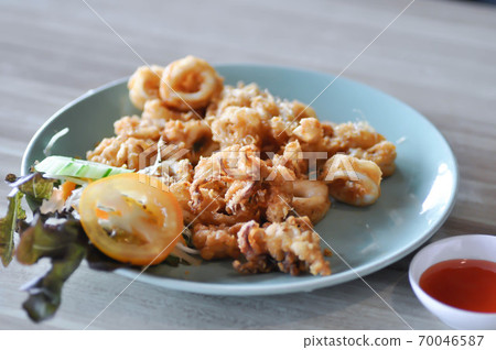 calamari or fried squid calamari or fried squid 70046587