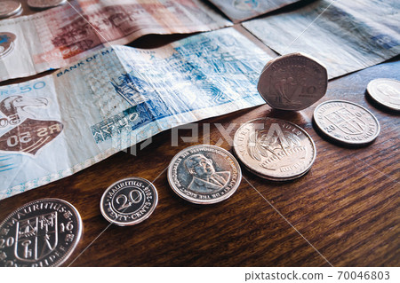 Mauritius money Mauritius Rupee MUR notes and coins close up Mauritius money Mauritius Rupee MUR notes and coins close up 70046803