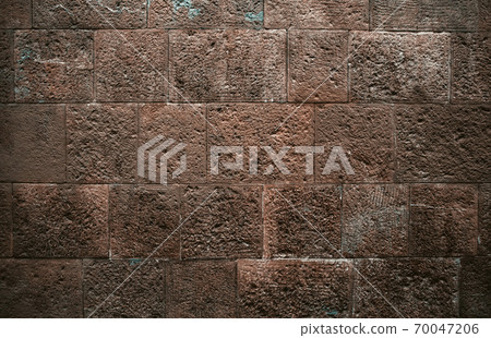 Dark porous brick. Background image. Ancient brick stone wall. High quality photo 70047206