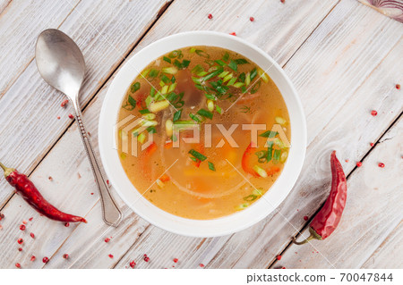 Homemade vegetable soup with green onions 70047844