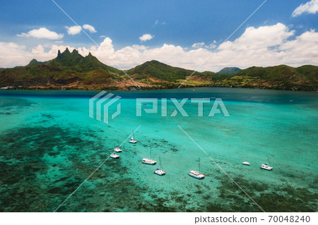 The view from the bird's eye view on the coast of Mauritius. Amazing landscapes of Mauritius.Beautiful coral reef of the island The view from the bird's eye view on the coast of Mauritius. Amazing landscapes of Mauritius.Beautiful coral reef of the island 70048240
