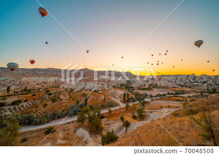 balloons in sunrise light in Cappadocia Turkey Goreme 70048508