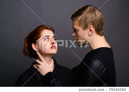 Desparate wife with aggressive husband in domestic violence conception 70048568