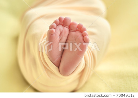 Baby's feet, fingers close up. newborn baby legs, massage concept of childhood 70049112