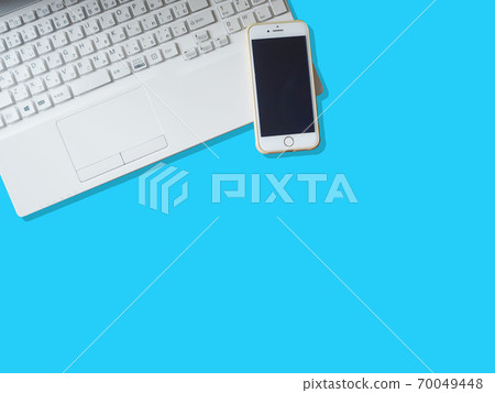 Laptops and mobile phones / smartphones on a light blue background 70049448