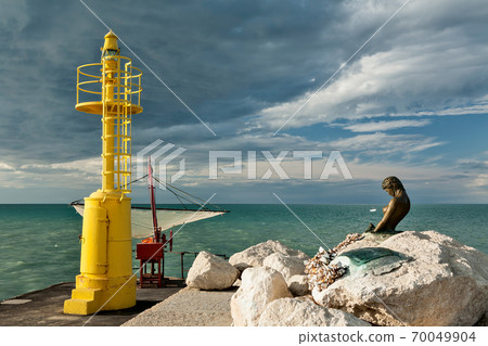 The pier in Senigallia at sunset. The pier in Senigallia at sunset. 70049904