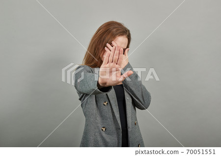 Palm arm raised air angry look straight you will not pass through facial Palm arm raised air angry look straight you will not pass through facial 70051551