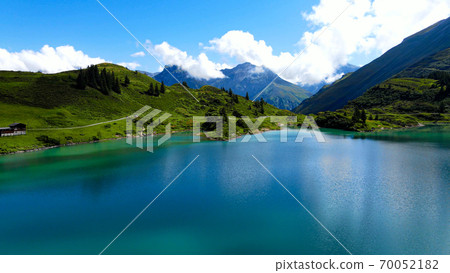 Flight over a wonderful mountain lake in the Swiss Alps - Lake Truebsee on Mount Titlis 70052182