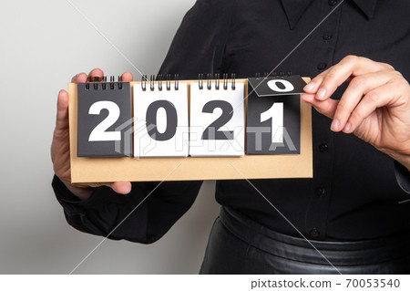 Changes from 2020 to 2021. New Year. Planning, opportunities and goals. Paper calendar Changes from 2020 to 2021. New Year. Planning, opportunities and goals. Paper calendar 70053540
