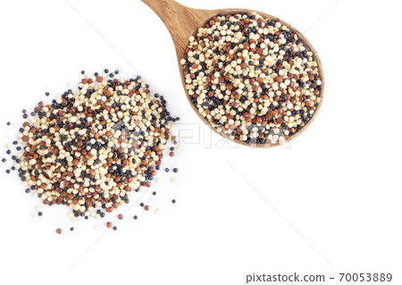 Quinoa in wooden spoon isolated on white background, health care concept 70053889