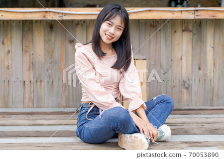 Portrait of asian happy woman smiling with wooden bridge, Selective focus Portrait of asian happy woman smiling with wooden bridge, Selective focus 70053890